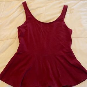 Burgundy peplum tank. Cotton soft.